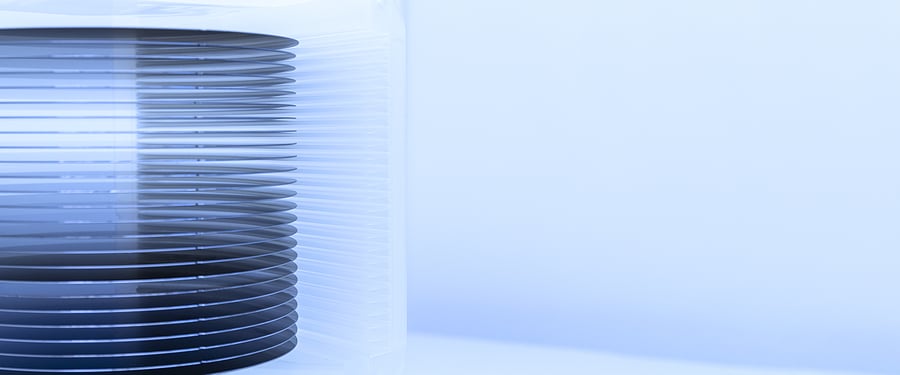 bigstock-A-Lot-Of-Silicon-Wafers-Packed-473133205