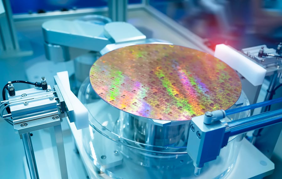 bigstock-Silicon-Wafers-and-Microcircui-415827346