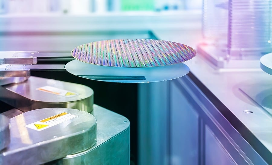 bigstock-Silicon-Wafers-and-Microcircui-435778421