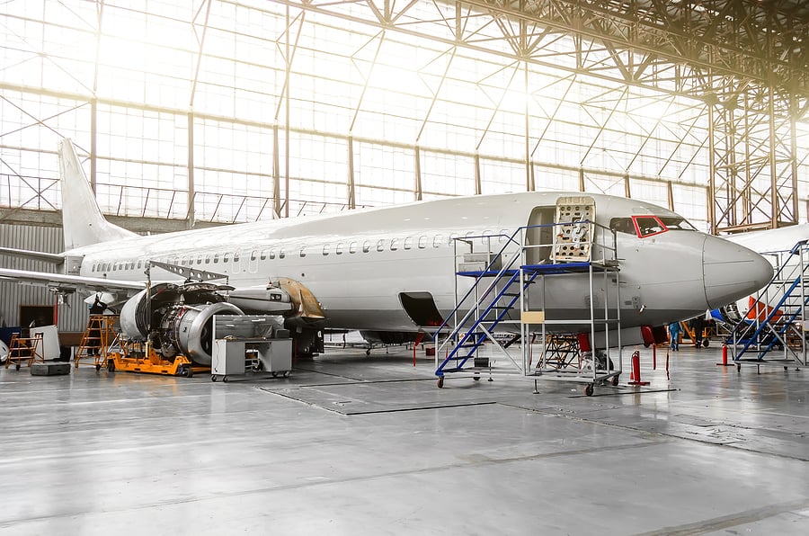 bigstock-Aircraft-In-The-Hangar-In-The--204016348