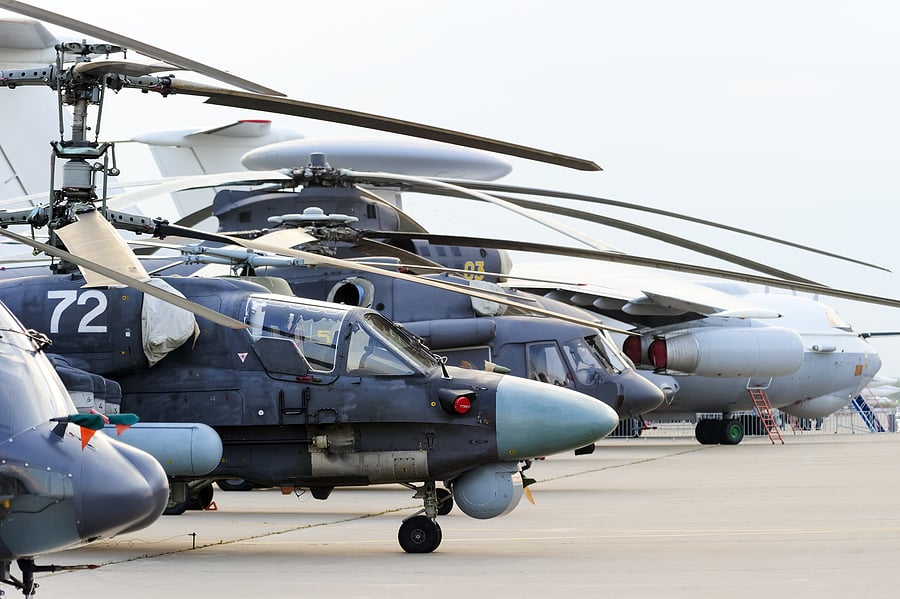 bigstock-Helicopters-and-planes-in-row-118181210
