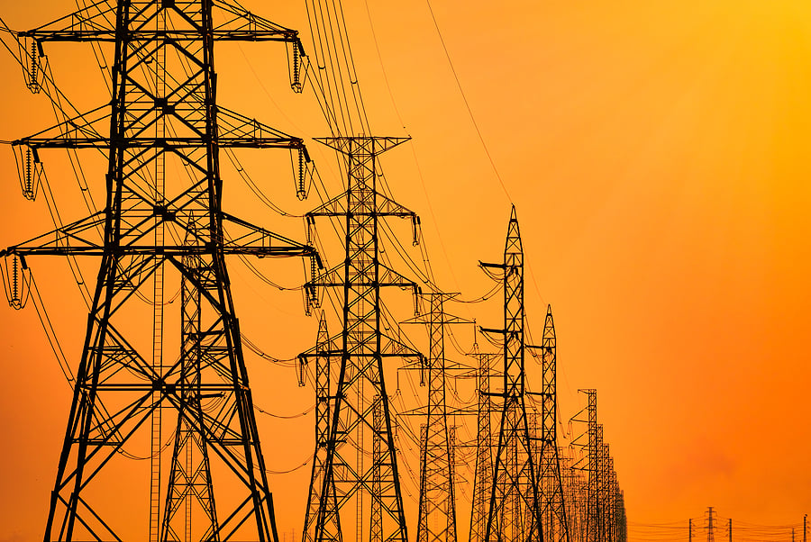 bigstock-High-Voltage-Electric-Pole-And-299162803
